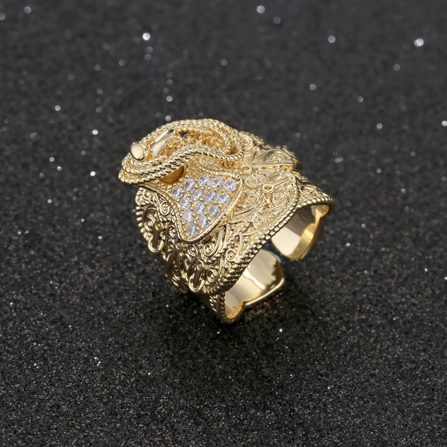 GOLD SADDLE RING WITH STONES